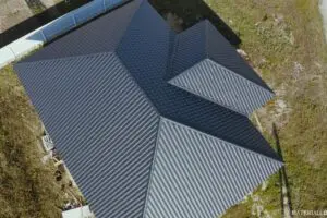 corrugated metal roof-arial view of black corrugated roof on a house