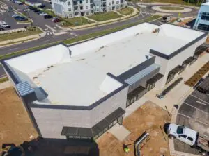 what is tpo roofing-arial view of a new commercial building with tpo roofing