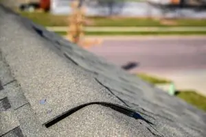 Asphalt shingle room with ridge cap