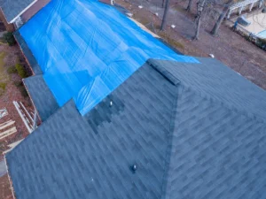 house roof covered with tarp
