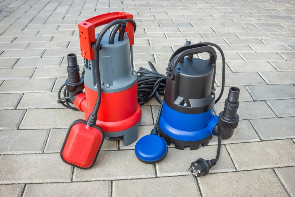 What Size Sump Pump Do I Need? (Homeowner's Guide) - All Phase Roofing & Restoration blue-and-red-sump-pumps
