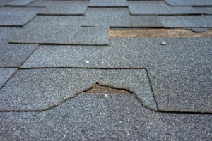 shingle repair-close up of cracked shingles