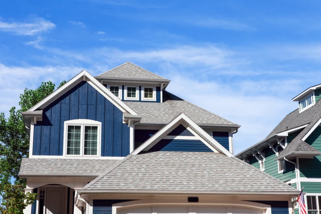 large blue siding shingle roof