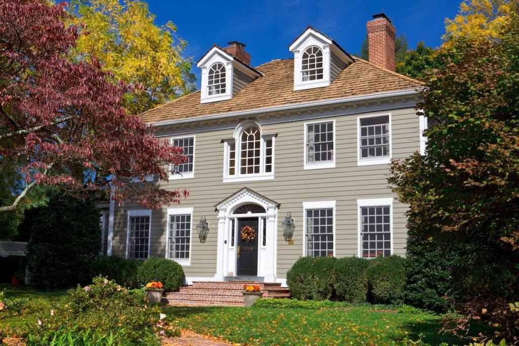 How to Add Curb Appeal to a Flat Front House? 8 Ideas - AllPhase Restoration Basic Blue House with Small Porch Georgian/Colonial revival style home