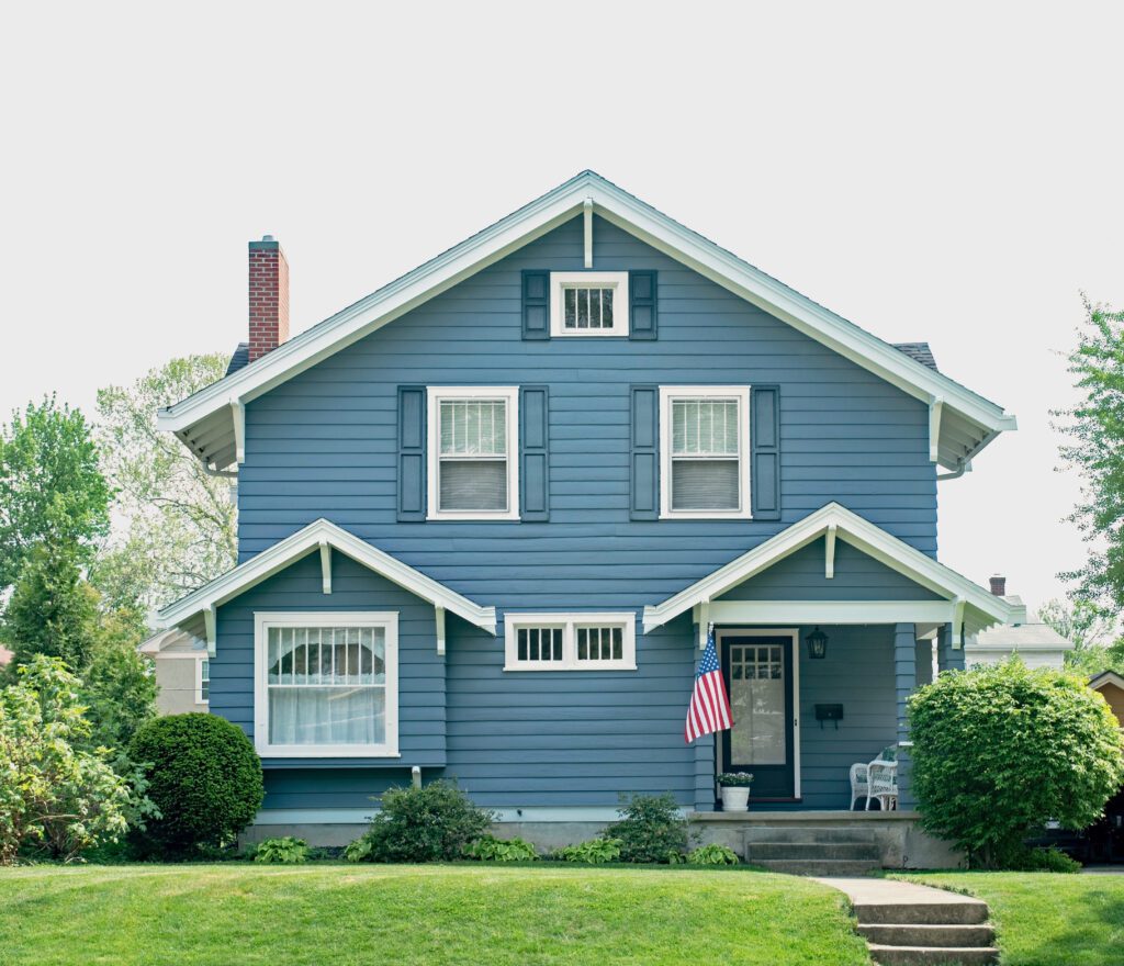 How to Add Curb Appeal to a Flat Front House? 8 Ideas - AllPhase Restoration how to add curb appeal to a flat front house Basic Blue House with Small Porch